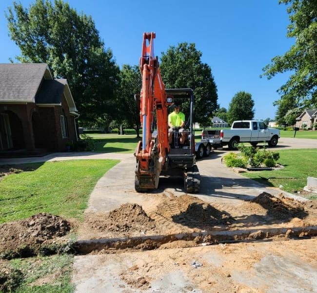 Taylor's Lawn Care Team at Work